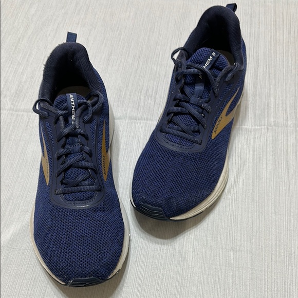 Brooks Other - Brooks Blue and Gold Athletic Sneakers with Sleek Design